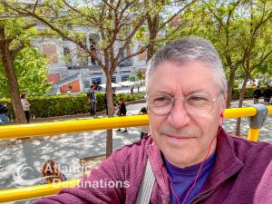 Derek on open top bus in Madrid